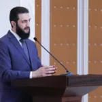 أحمد الشرع يتحدث في مؤتمر صحفي سابق في دمشق (الأناضول-أرشيف)